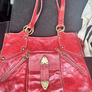 Elegant Red Shoulder Bag with Gold Details